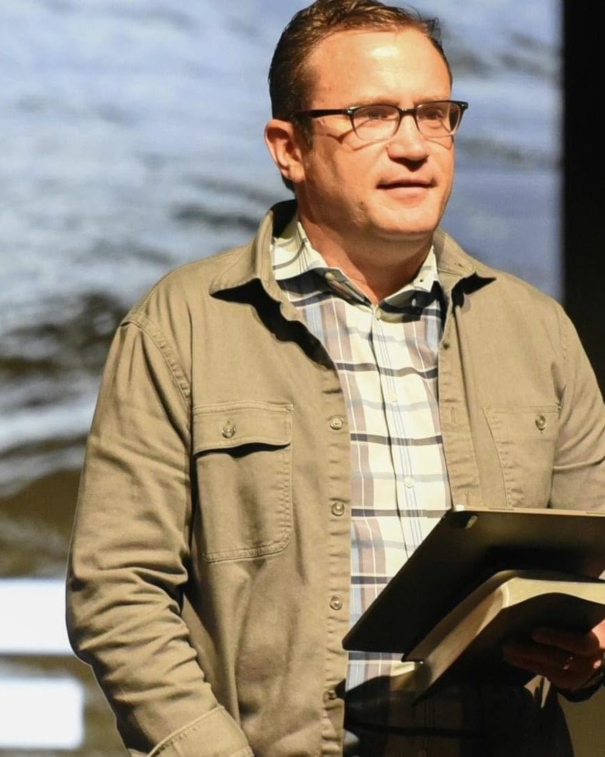 Mike Holt teaching on stage